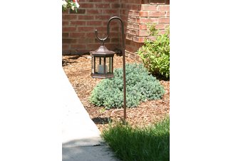 Six sided, clear glass, brown solar lantern with shepherds hook pole