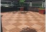 Four piece bamboo composite deck tiles